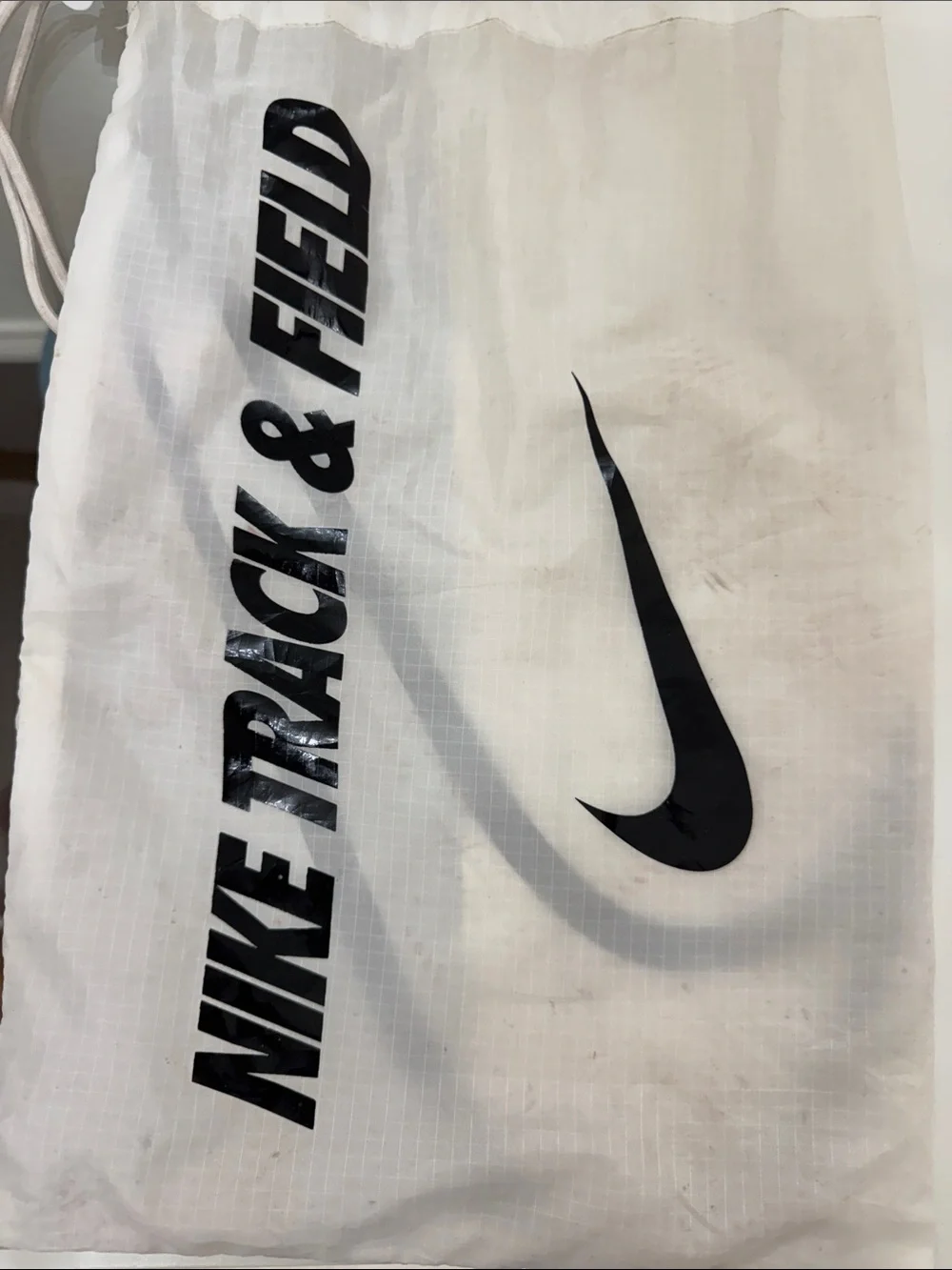 Nike Cream and Black Track Spikes